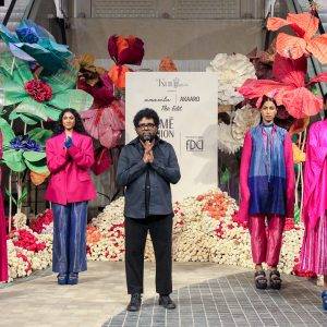 Designer walks with model in the ramp during the AKAARO show at Lakmé Fashion Week 2025, held on October 8th at The Kunj in New Delhi, India.Photo : FS Media Pro / FDCI x Lakme Fashion Week / RISE Worldwide